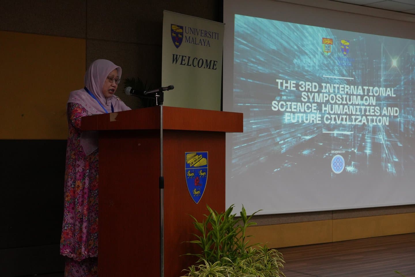 A speaker addressing the symposium