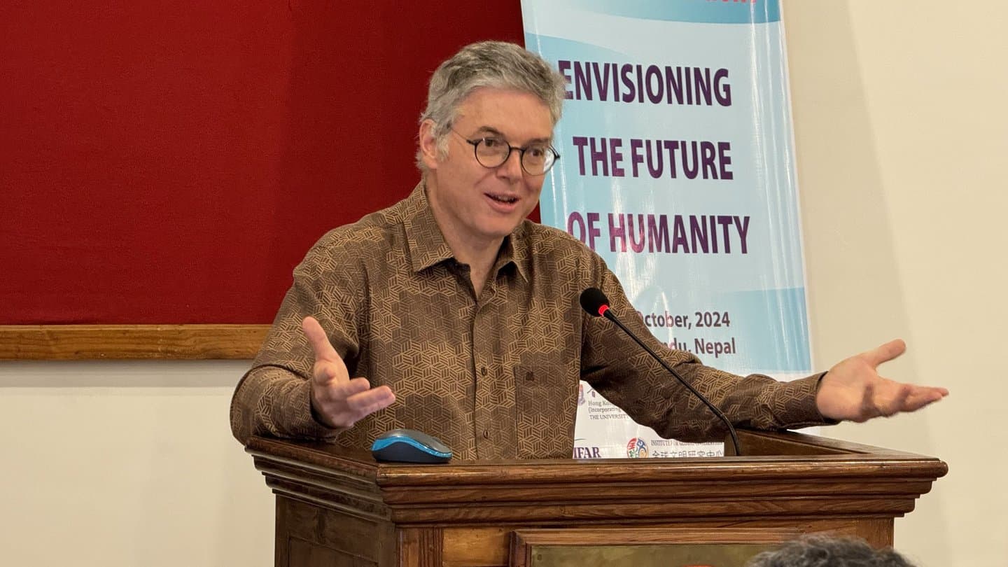 A speaker addressing the conference